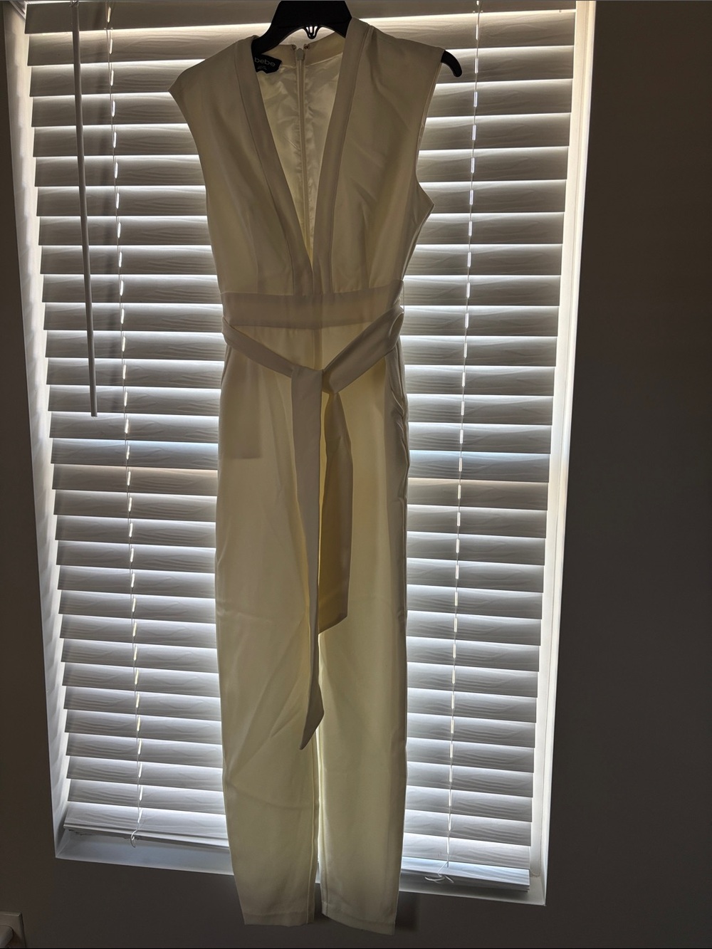 bebe Cream Sleeveless V-Neck Jumpsuit with Waist Tie